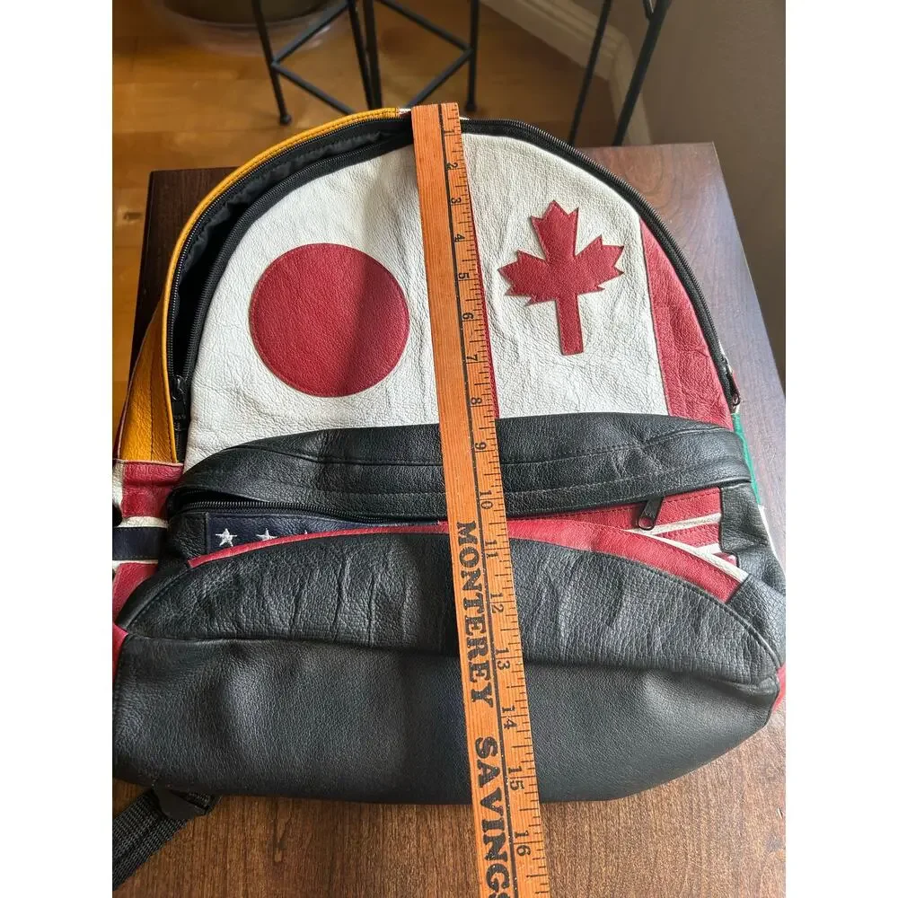Vintage Wilsons Leather Multi-National backpack leather flag USA Japan Canada